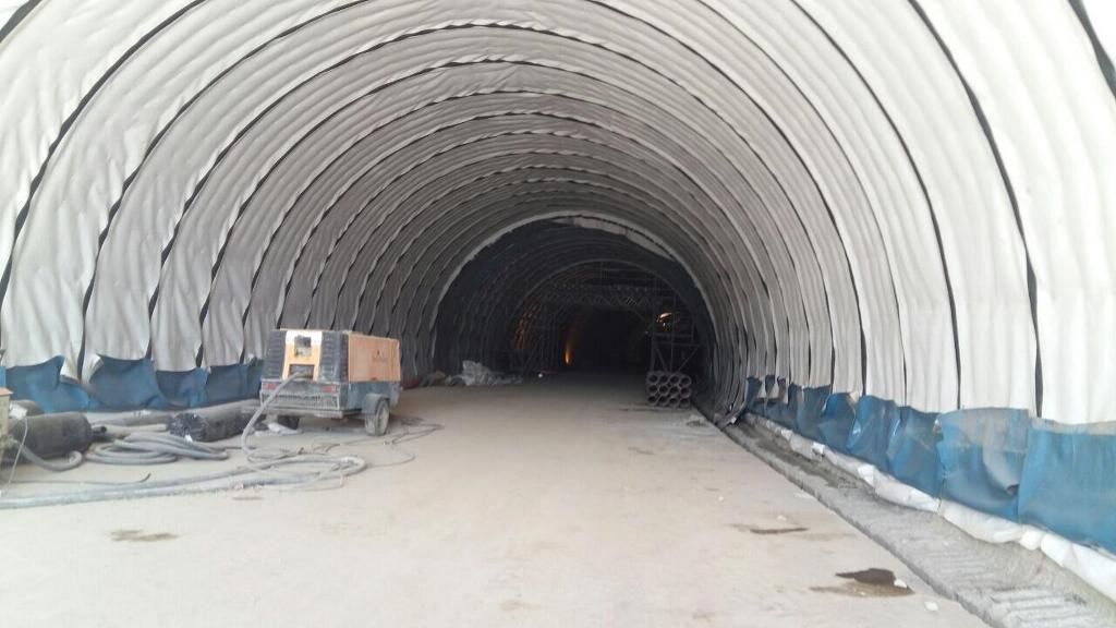 Shotcrete-lined tunnel with exposed rock face